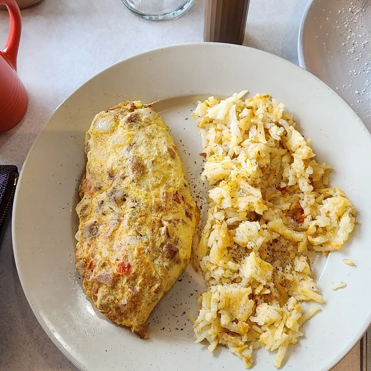 Meat Lover's Omlette and Hash Browns
