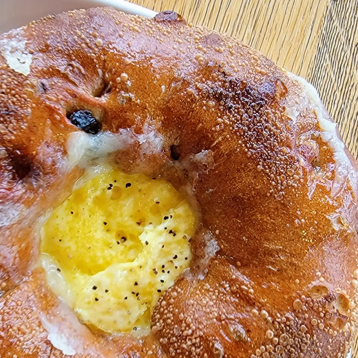 Egg and Cheese on Cinnamon Raisin Bagel