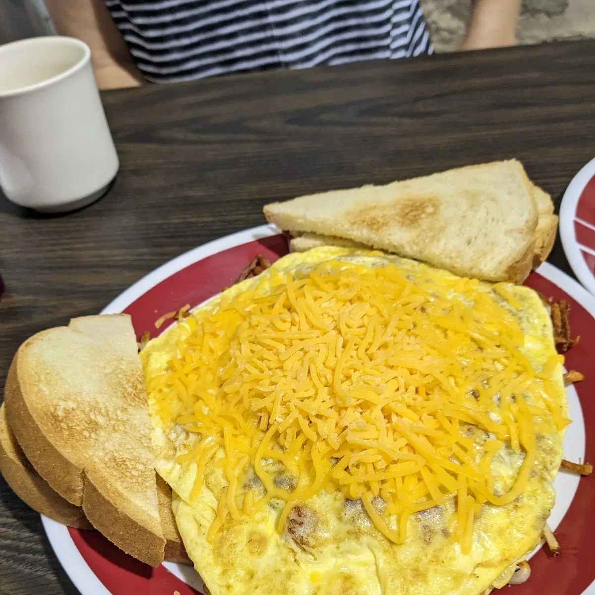 3 Ham and Cheese Omelette over Hash Browns It’S Huge