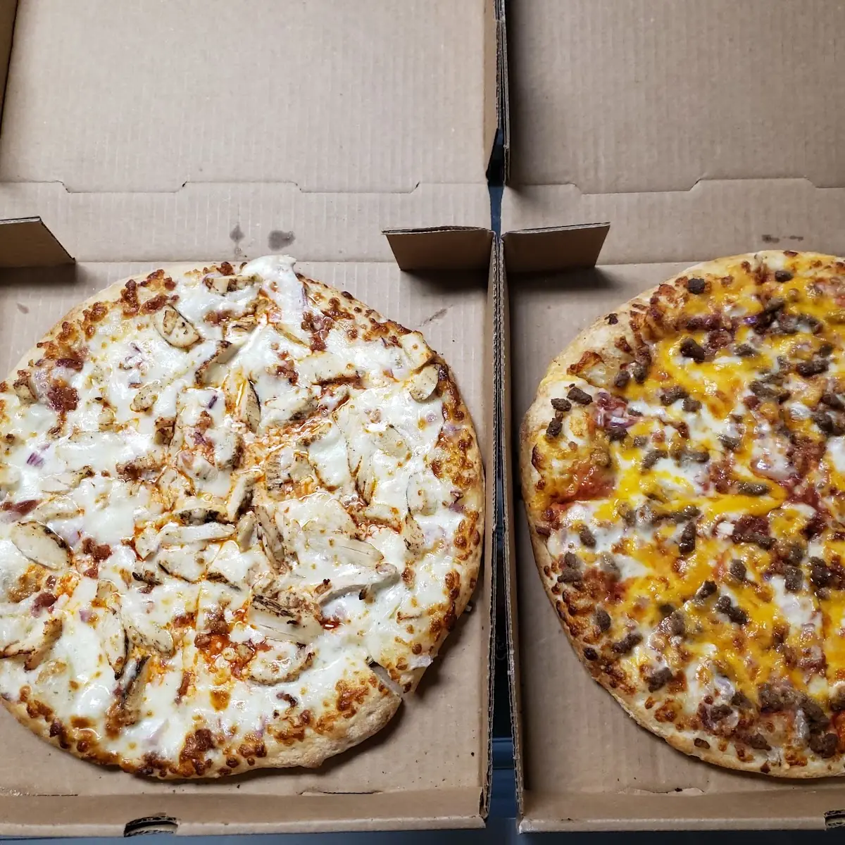 Left Medium Buffalo Chicken Right Bacon Cheeseburger Pizza