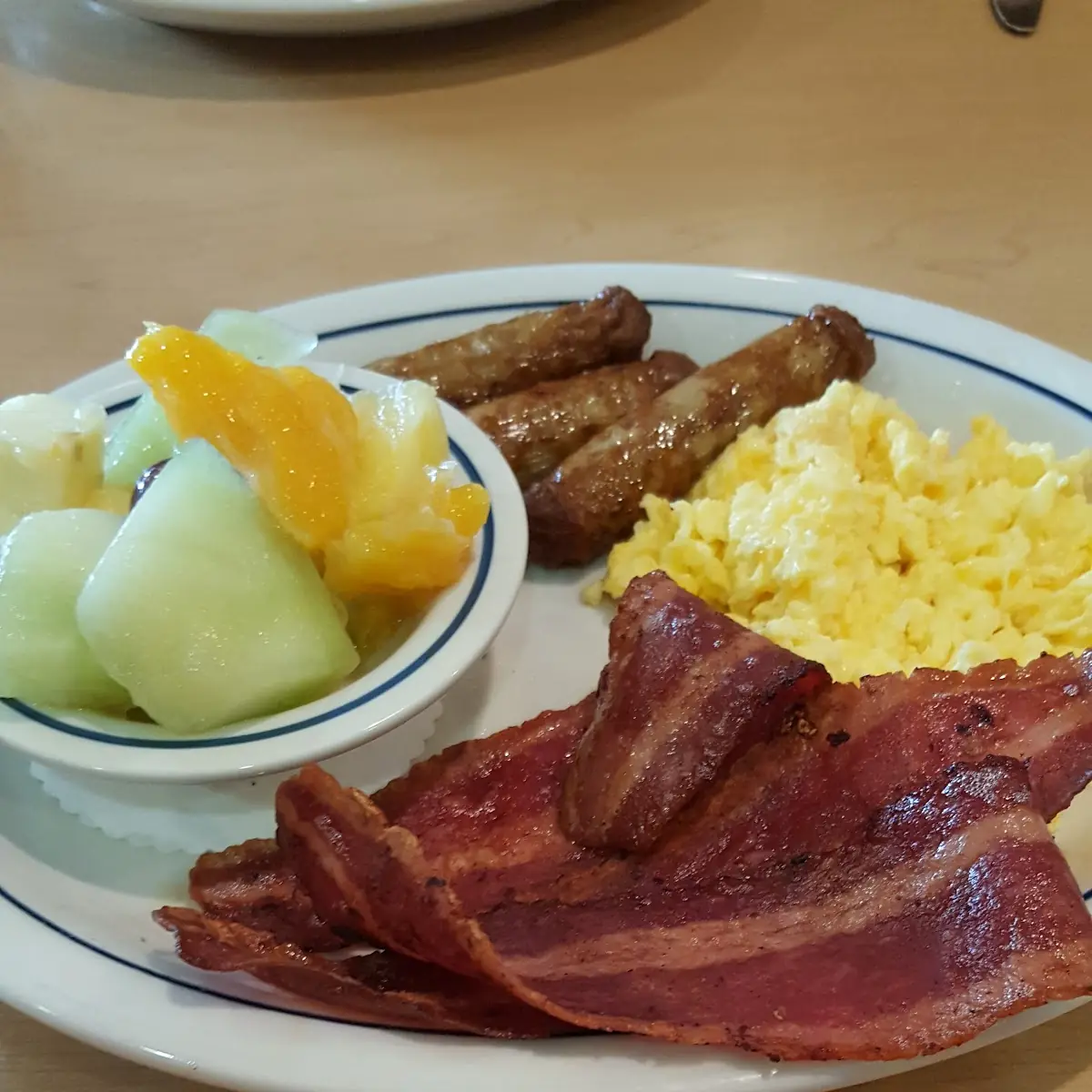Workout Scrambled Eggs with Cheese Turkey Bacon Turkey Sausage and Fruit