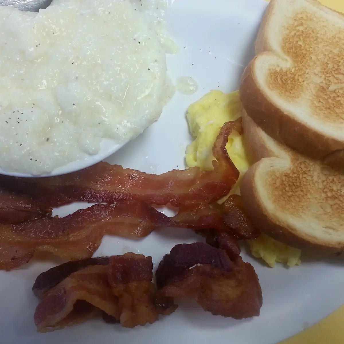 Bacon Eggs Toast and Grits