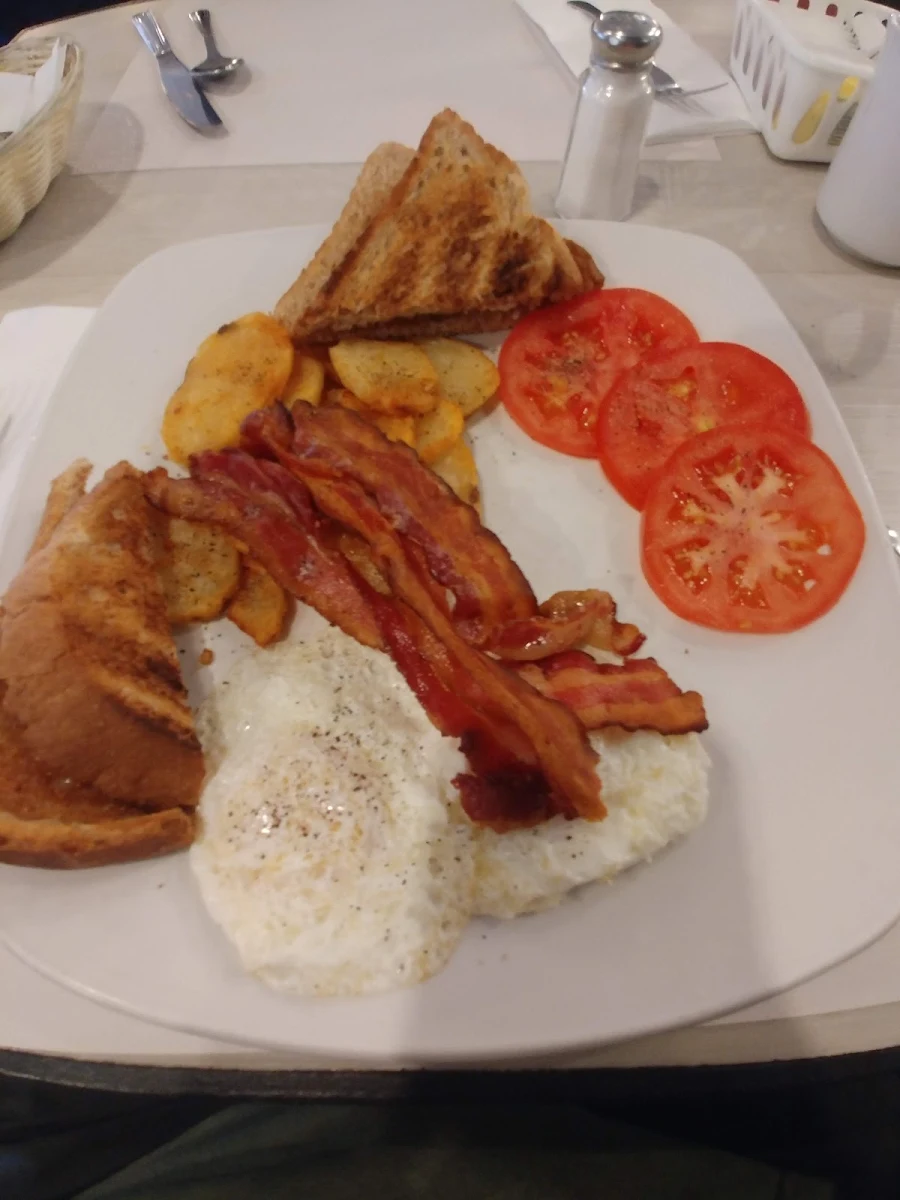 Classic Eggs and Bacon with Tomatoes and a Side of Toast