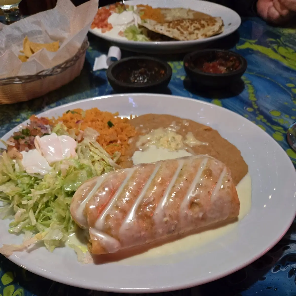 Shredded Chicken Enchiladas with Rice and Beans