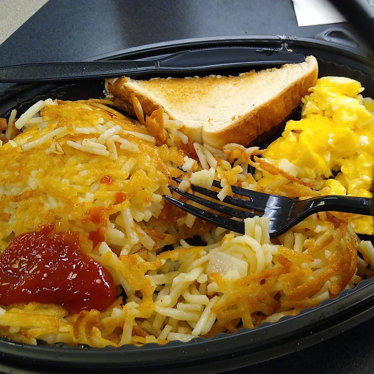 Scrambled Eggs and Hash Browns and Toast