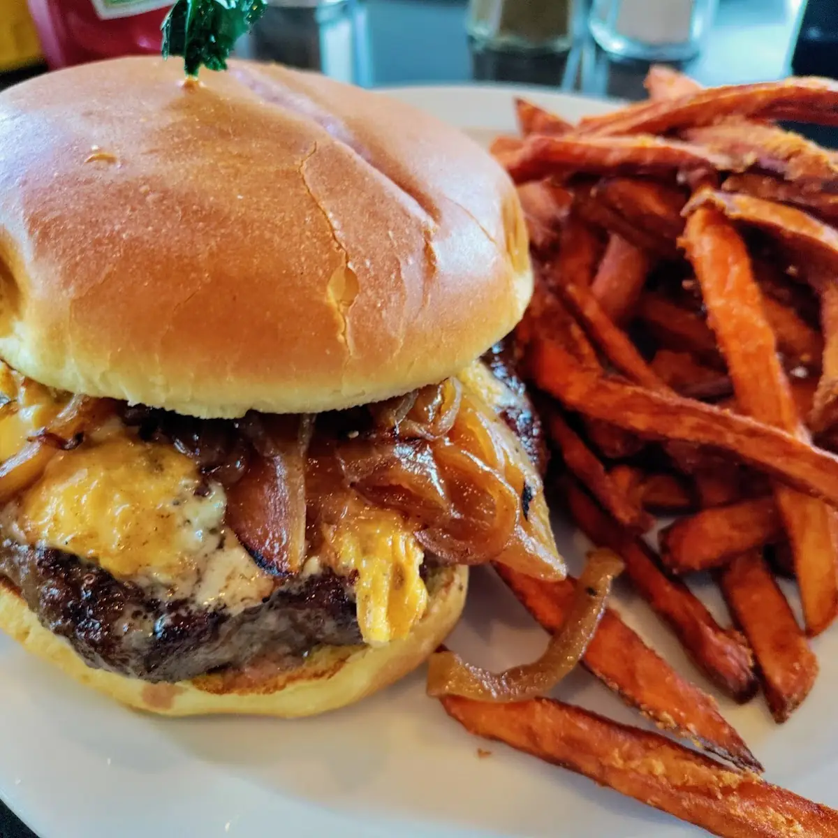 Burger with Grilled Onions and Blue Cheese Crumbles