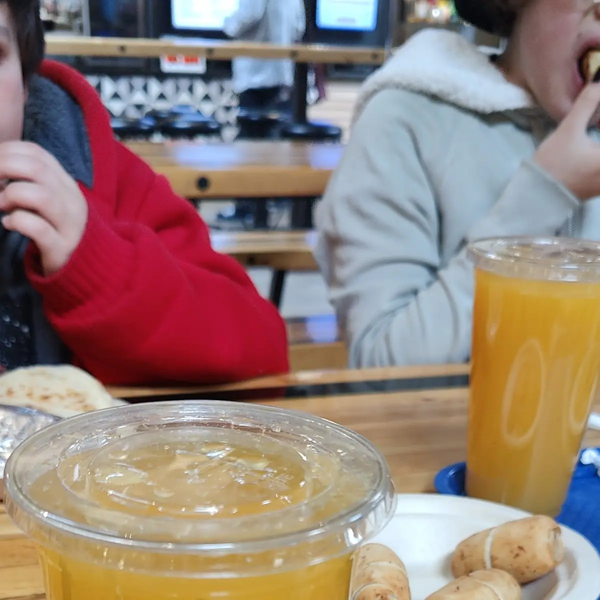 24oz Passion Fruit Juice and Tequeños
