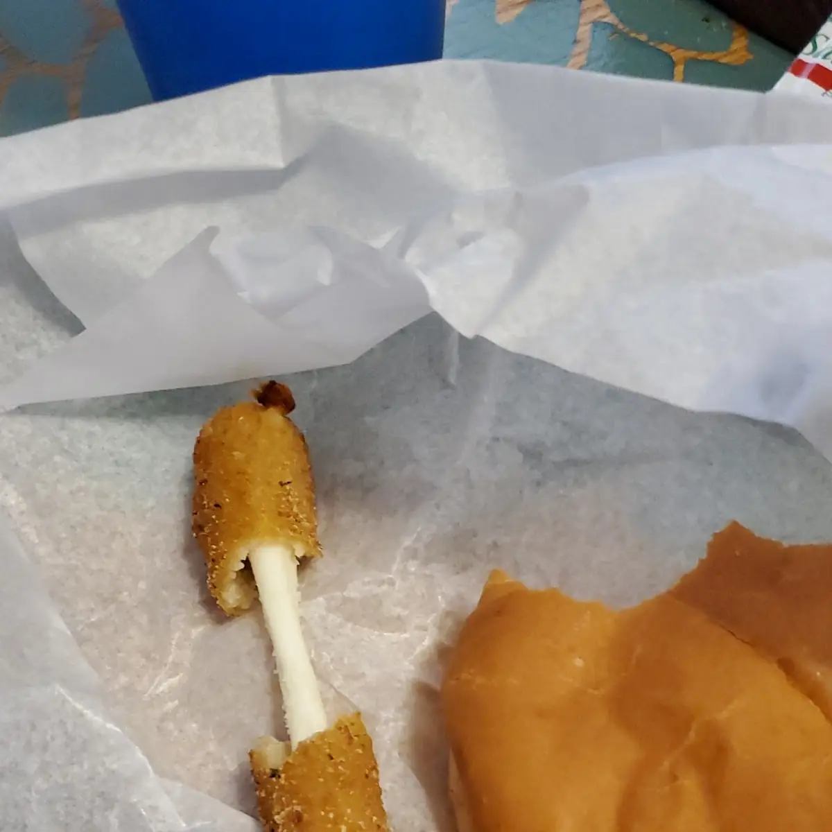 Plain Cheeseburger and Mozzarella Sticks