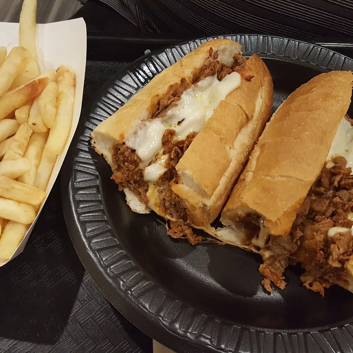 Pizza Steak Sub and Fries
