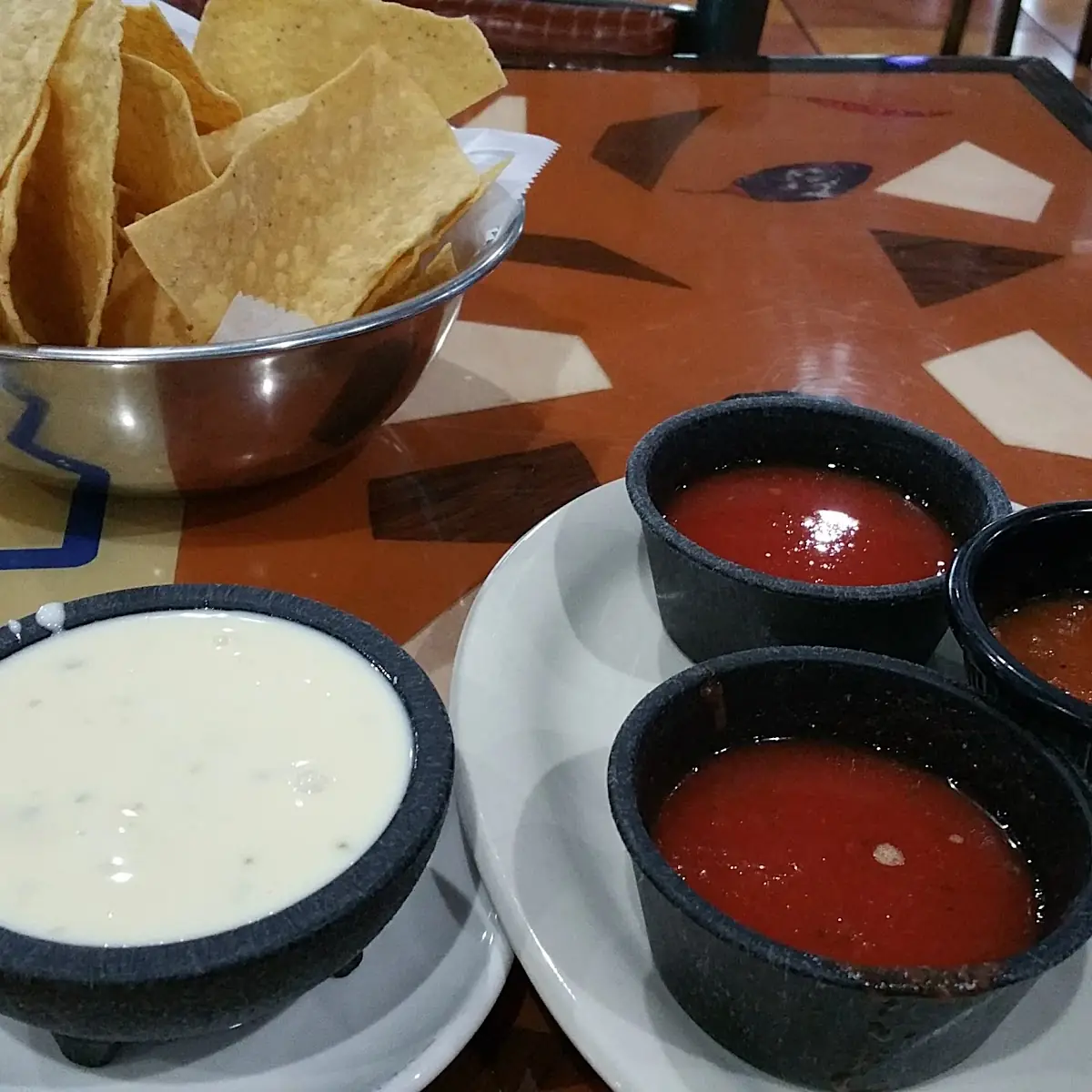 Chips Salsa and Queso Cheese