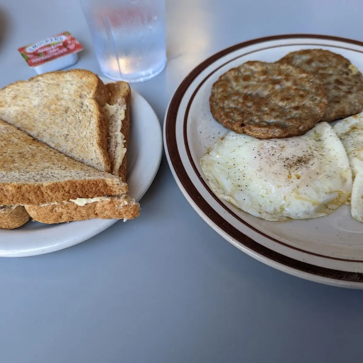 Two Eggs with Sausage Patties & Wheat Toast