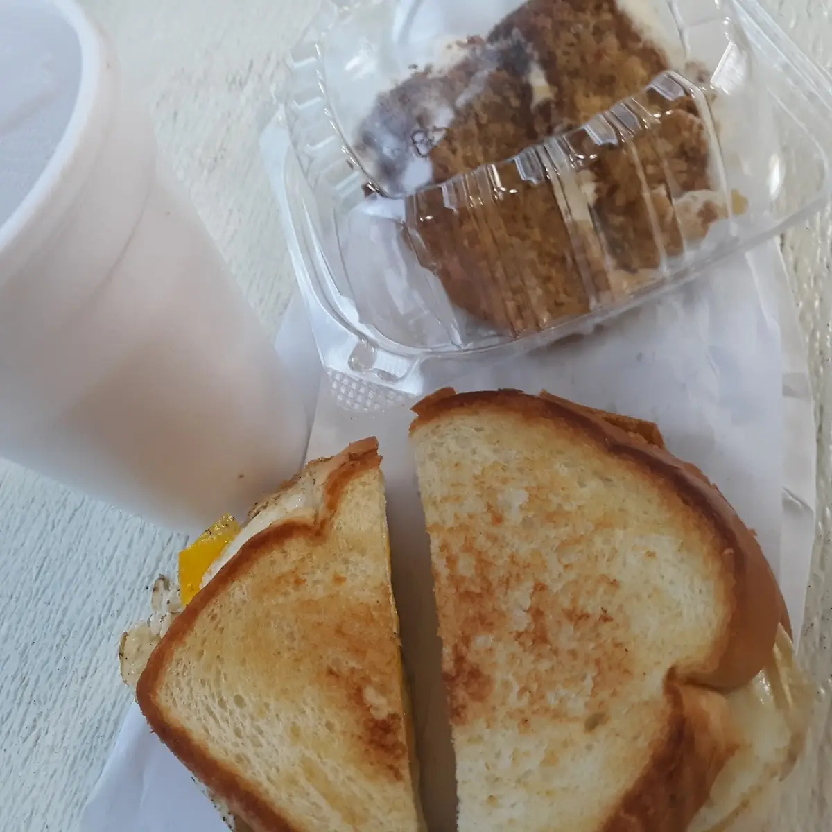 Double Egg Sandwich on Toasted Bread Coffee and Carrot Cake