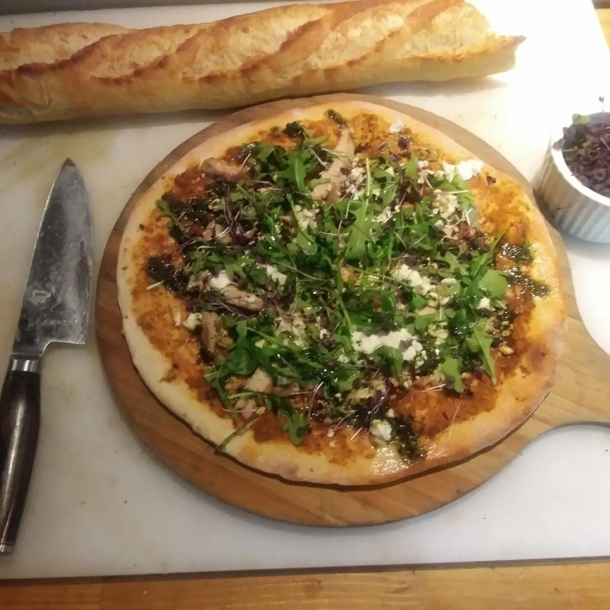 Wood Fired Hand Made Pizza Roasted Red Pepper Chicken Arugula Micro Basil with a Basil Garlic Oil
