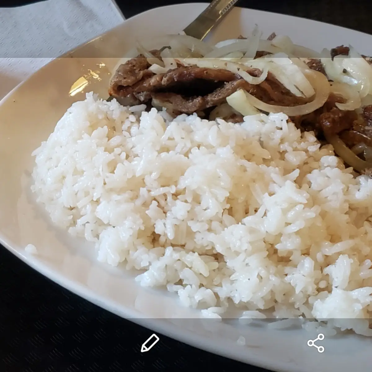 Bistec Encebollado and White Rice