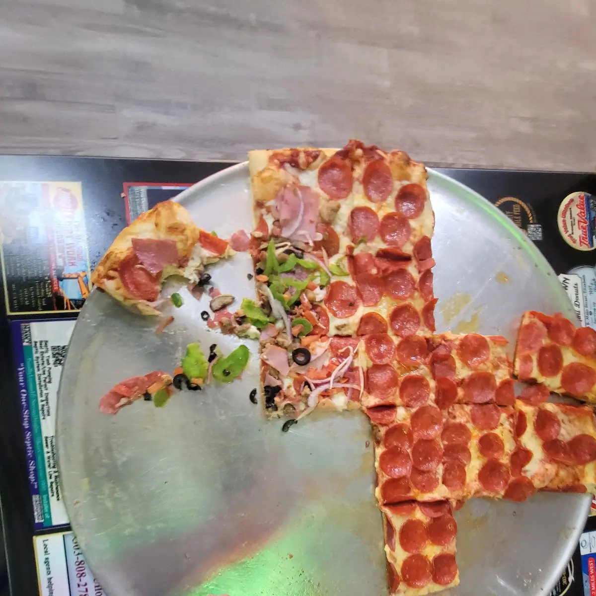 Kitchen Sink Pizza and Half Pepperoni Pizza