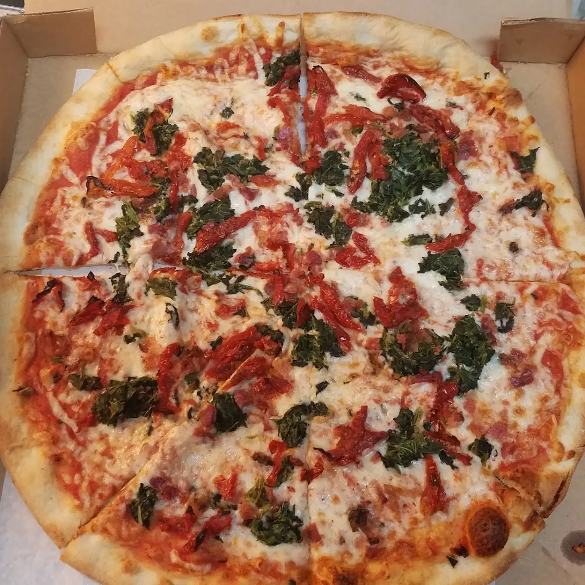 Bacon Spinach and Sun Dried Tomato Pizza