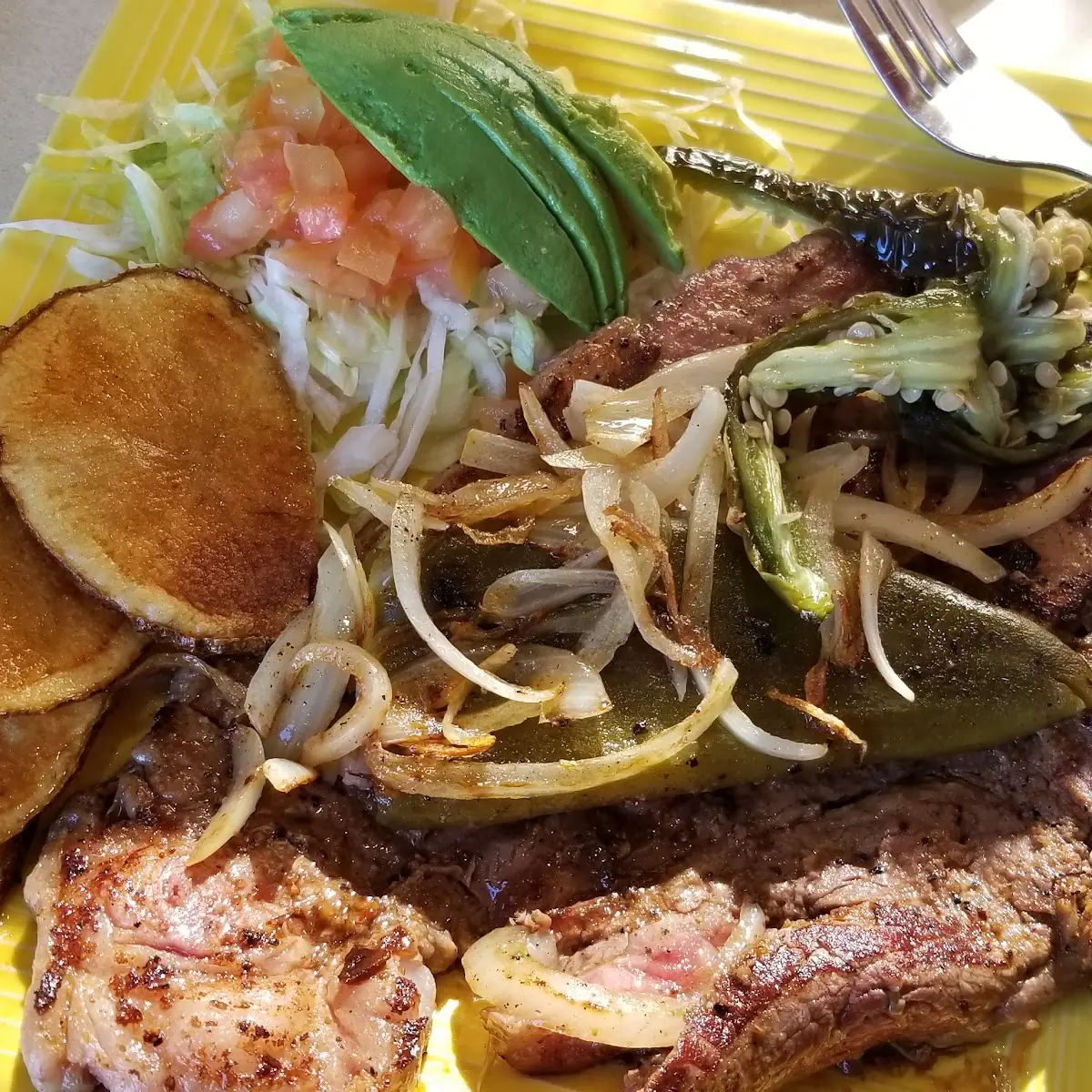 T Bone Steak with Grilled Onions and Peppers