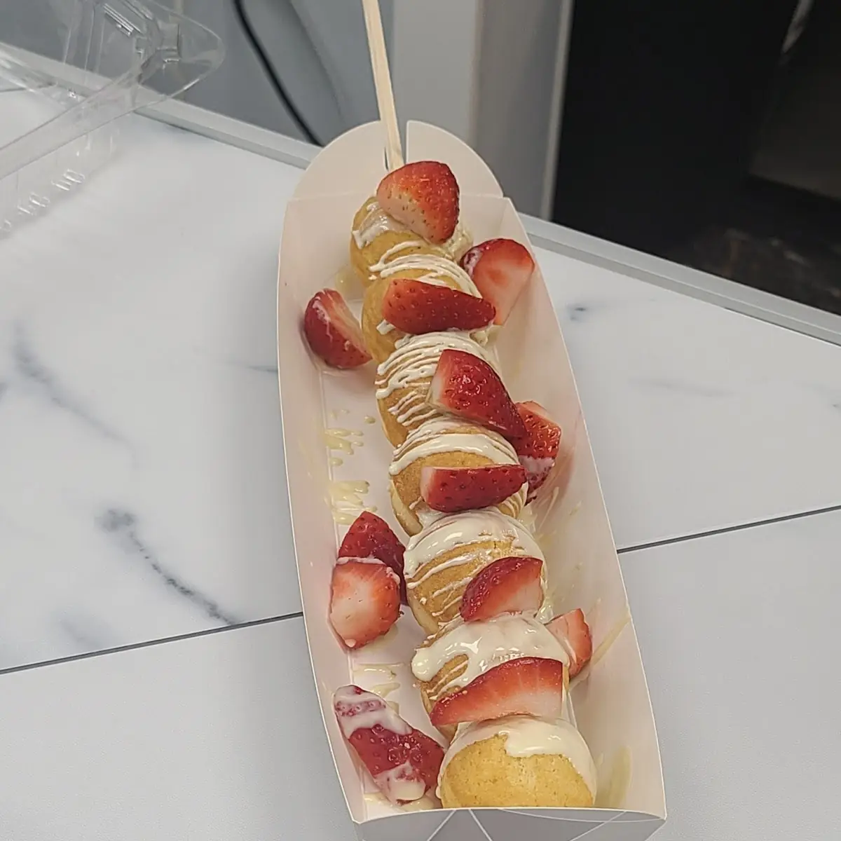 Bubble Waffle with Strawberries and White Chocolate