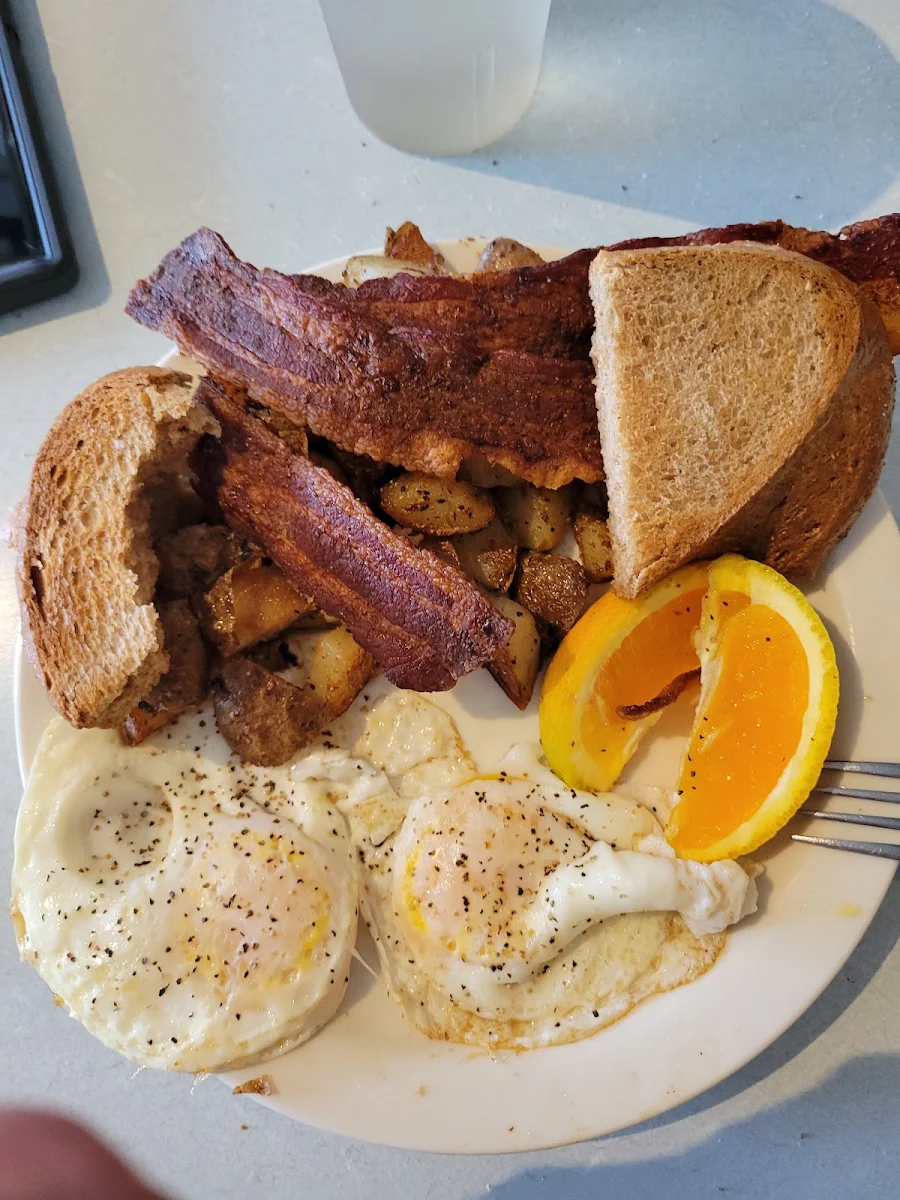 Bacon and Eggs Hash Browns Wheat Toast