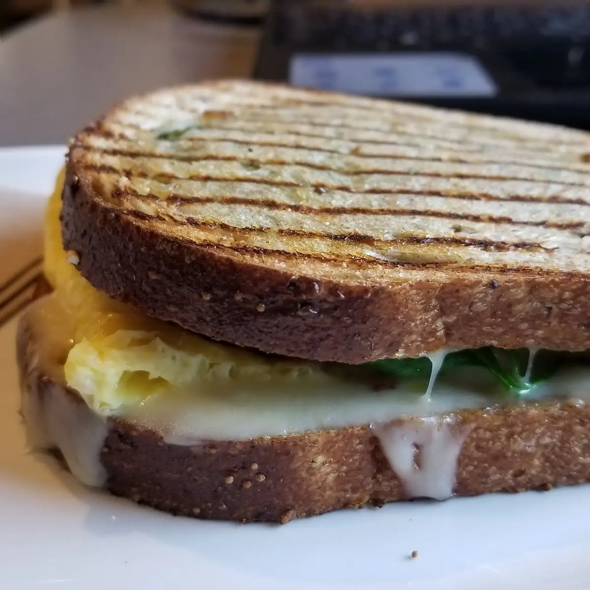 Spinach Avocado Egg White with Scrambled Egg and Cheese Sandwich