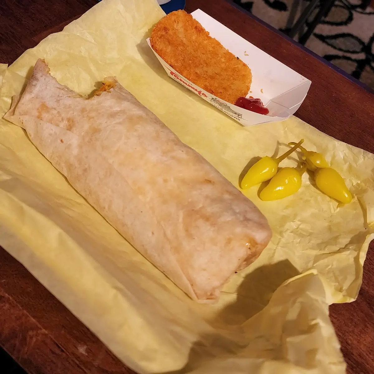 Breakfast Burrito and a Hash Brown w Chilies