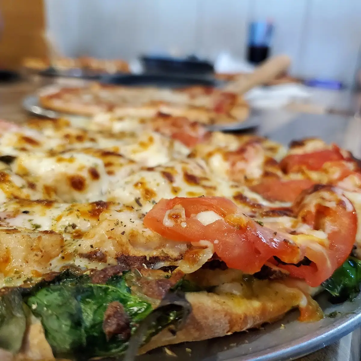 Spinach Tomato Basil Pesto Pizza