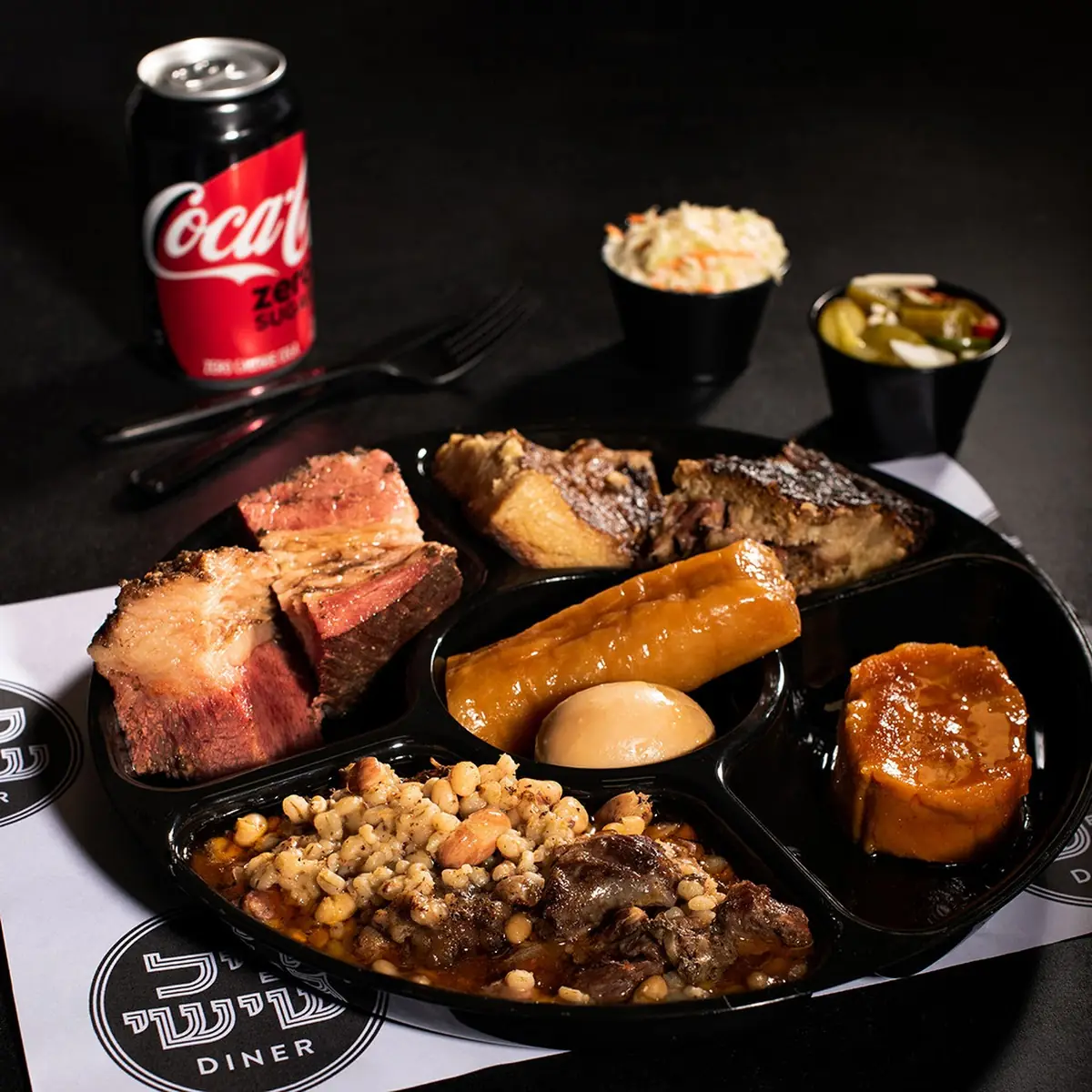 Cholent Platter Beef Potato Kugel Kishka Marrow Bone Brown Egg Sour Pickles Coleslaw
