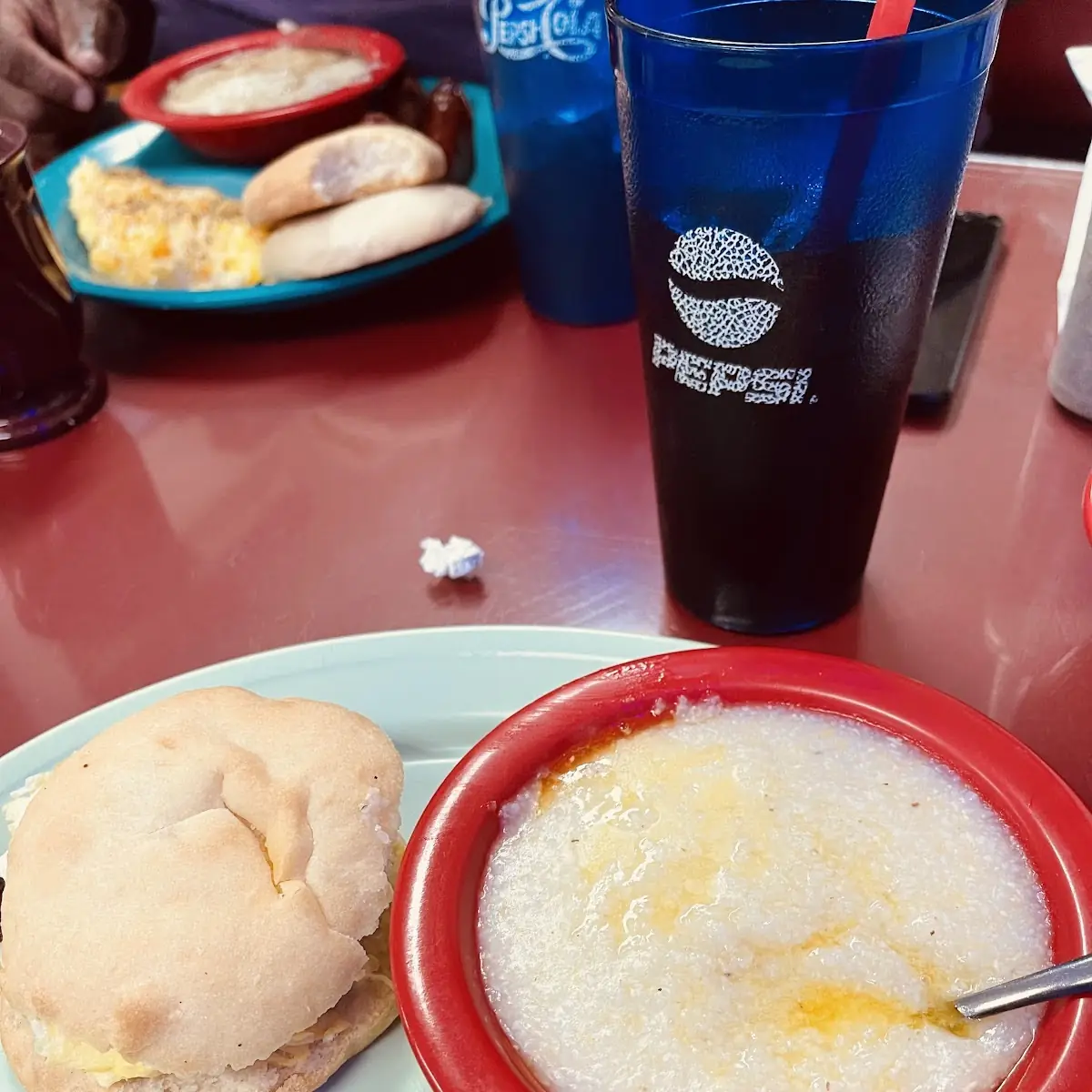 Sausage Egg Biscuit and Butter Grits