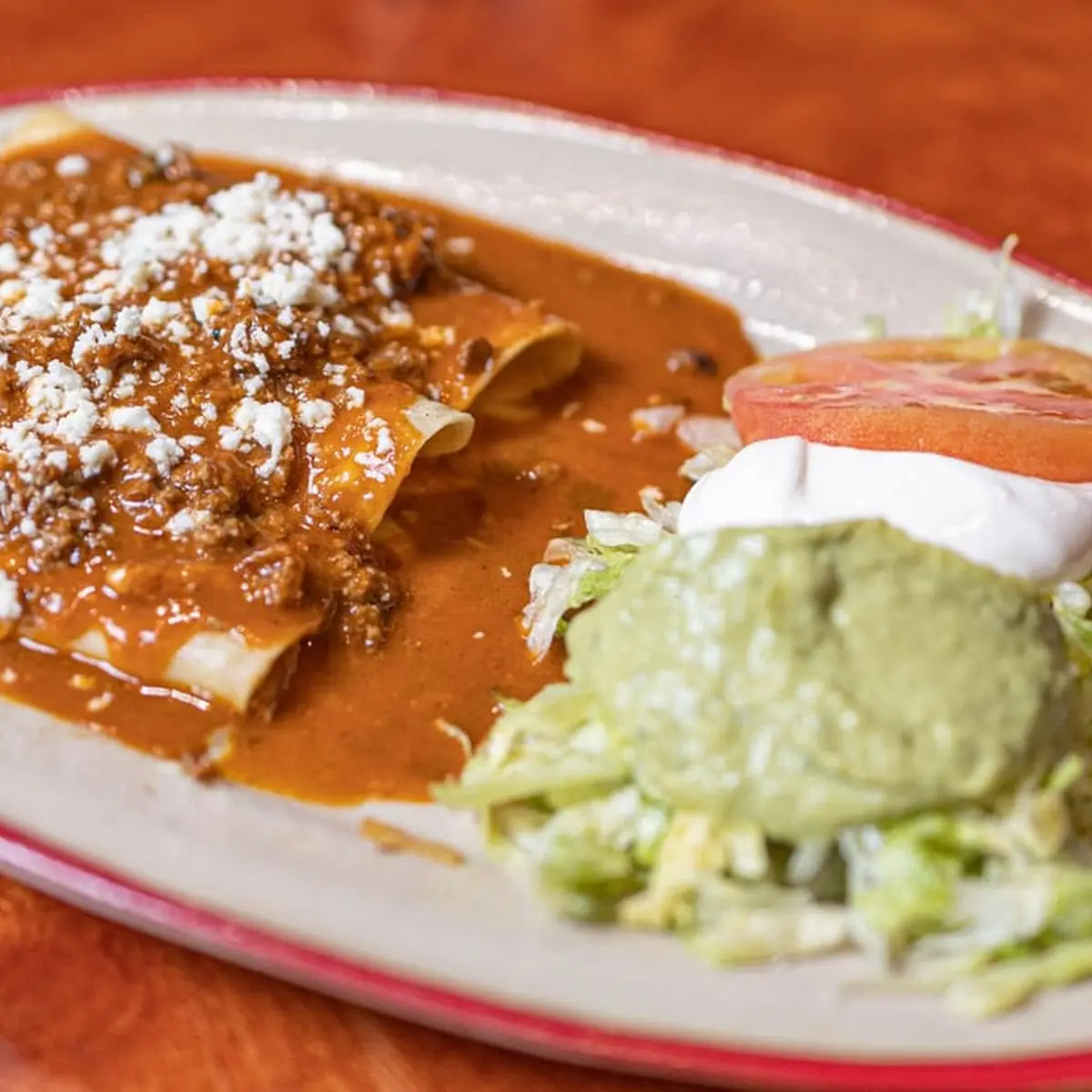 Beef Enchiladas with Cheese Sauce Rice & Beans