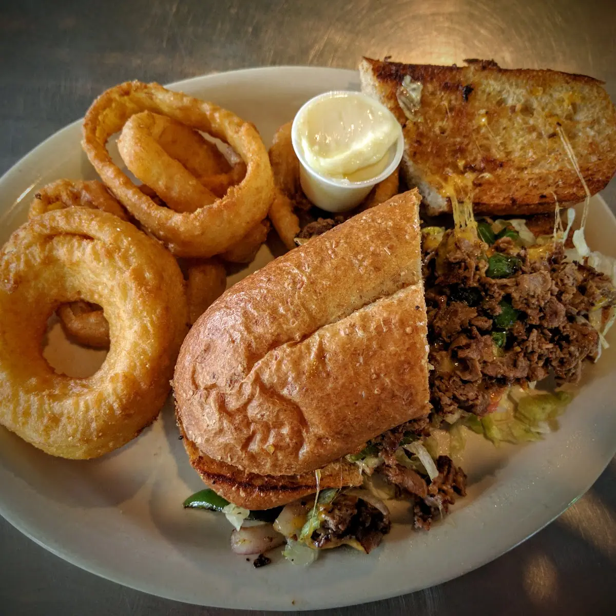 Steak Sandwich and Onion Rings