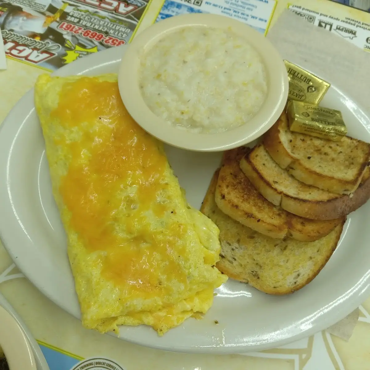 Meat Lovers Omelette Grits