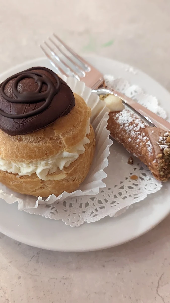 Freshly Made Cannoli and Bun with Whipped Cream