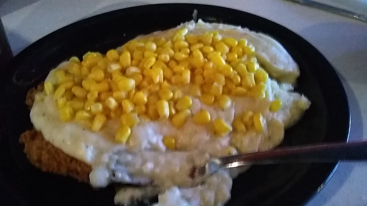 Chicken Fried Steak with Mashed Potatoes and Gravy and Corn