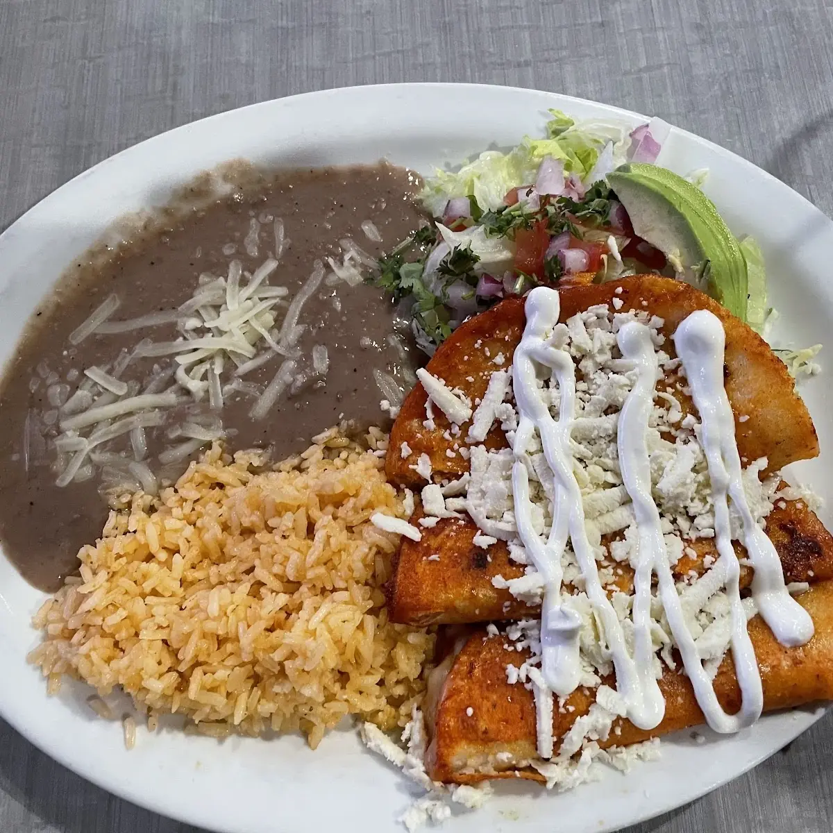 Chicken Flautas with a Side Salad Rice & Beans