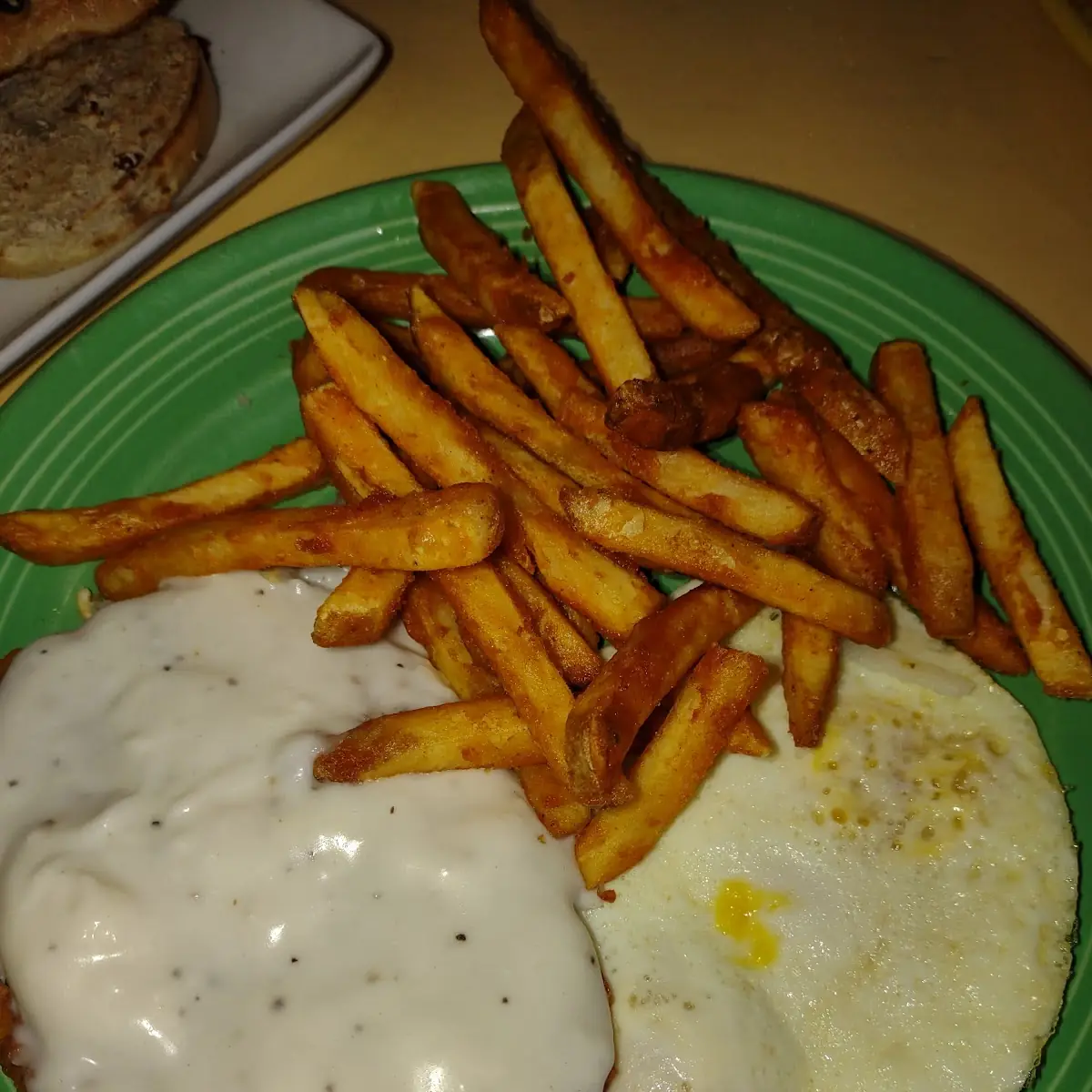 Chicken Fried Steak and Eggs with Fries