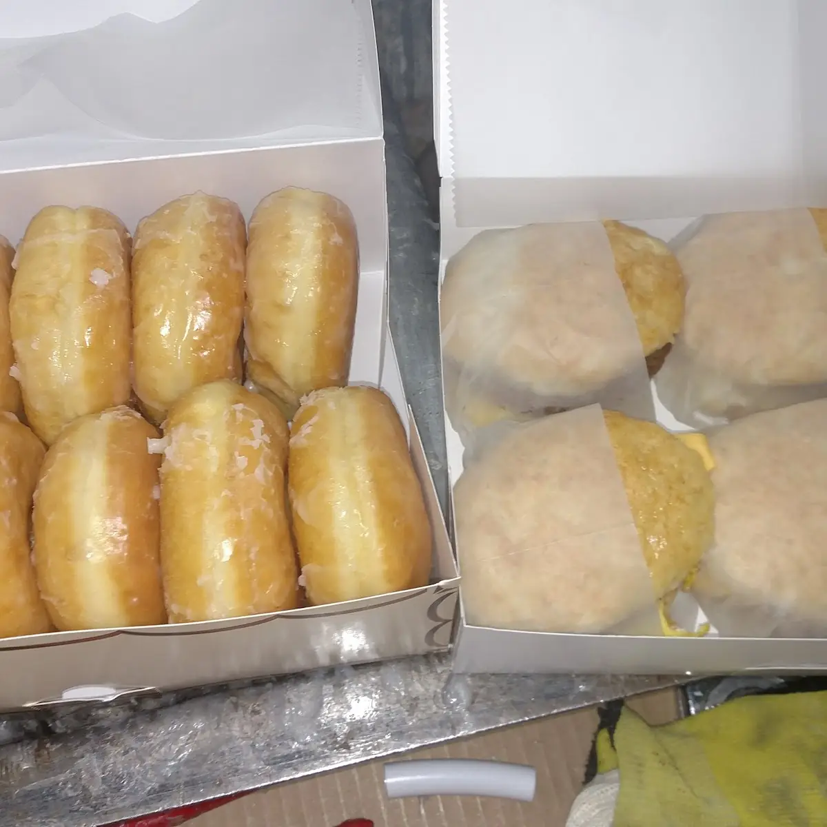 Glazed Donuts and Sausage Eggs and Cheese Biscuit