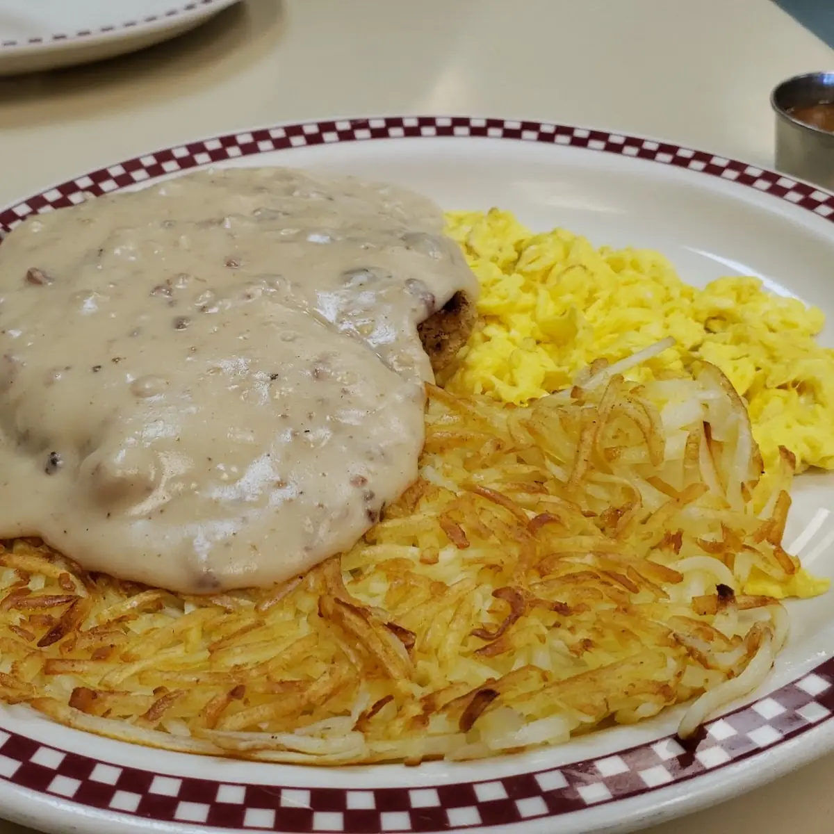 Chicken Fried Steak with Scrambled Eggs and Hashbrown