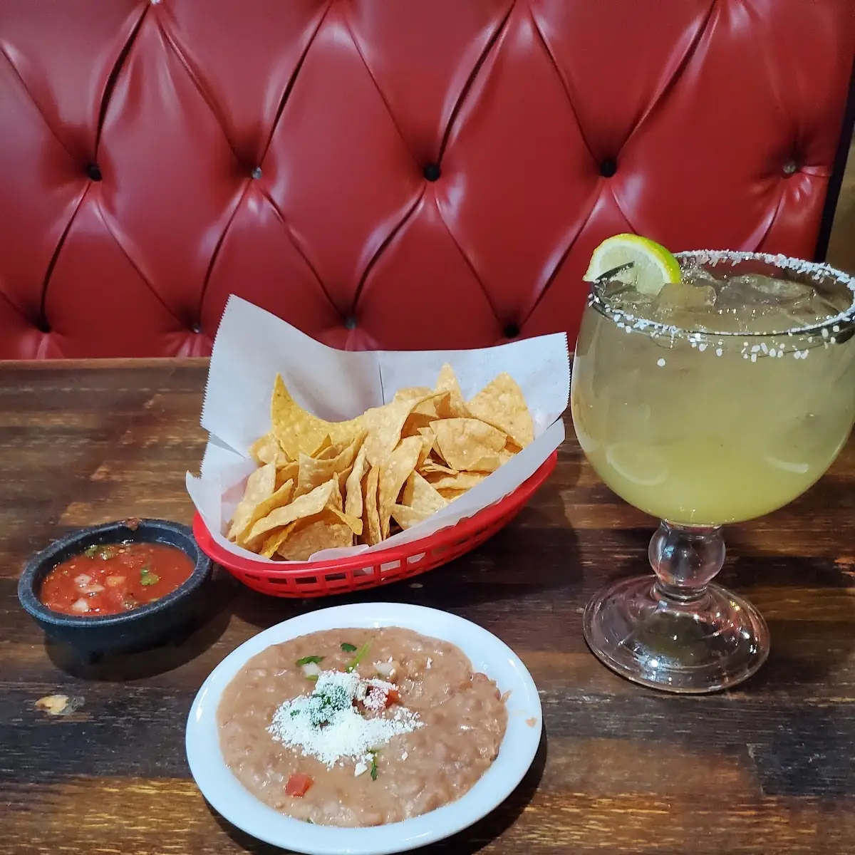 Complimentary Chips and Salsa with Refried Beans