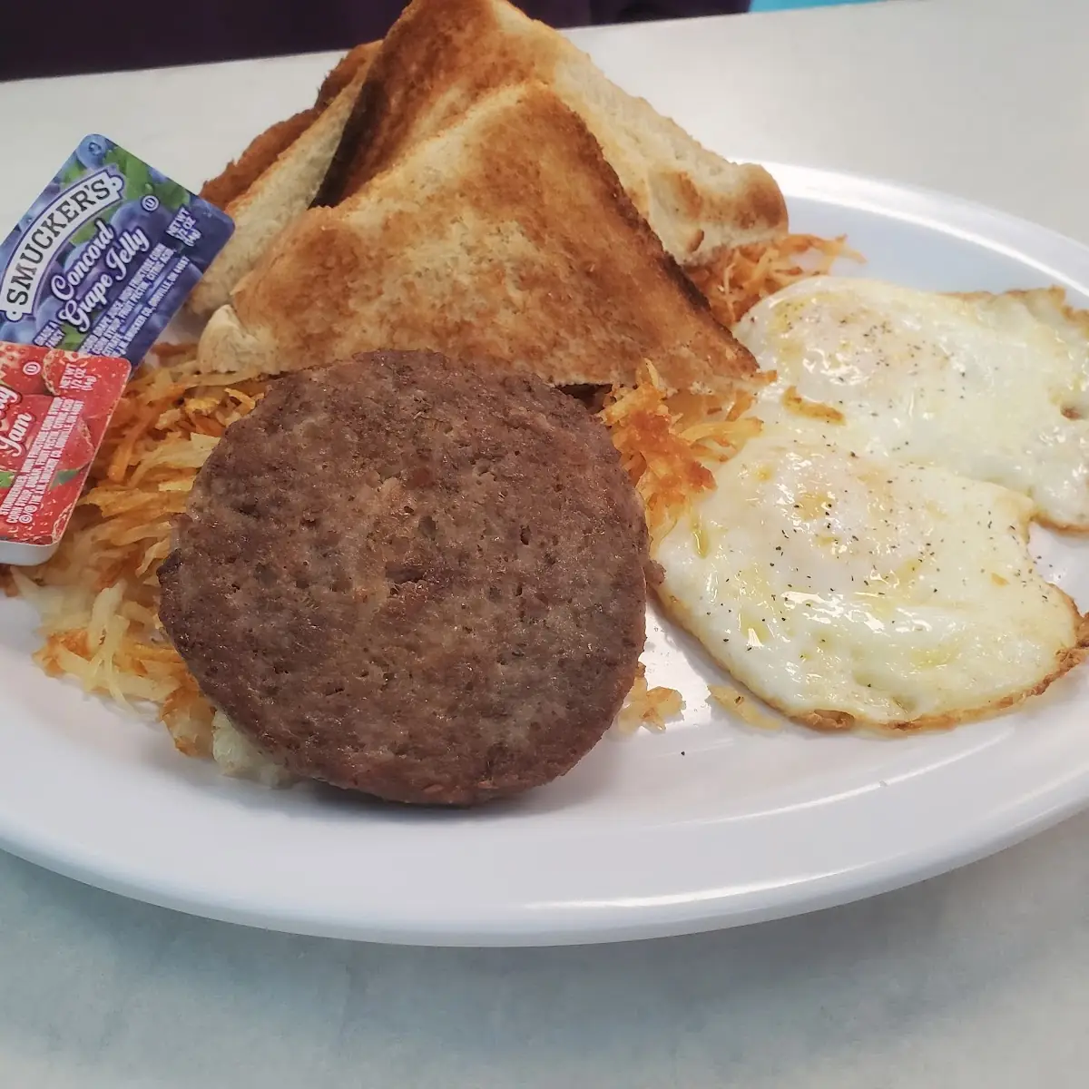 Eggs Sausage Hash Browns & Toast