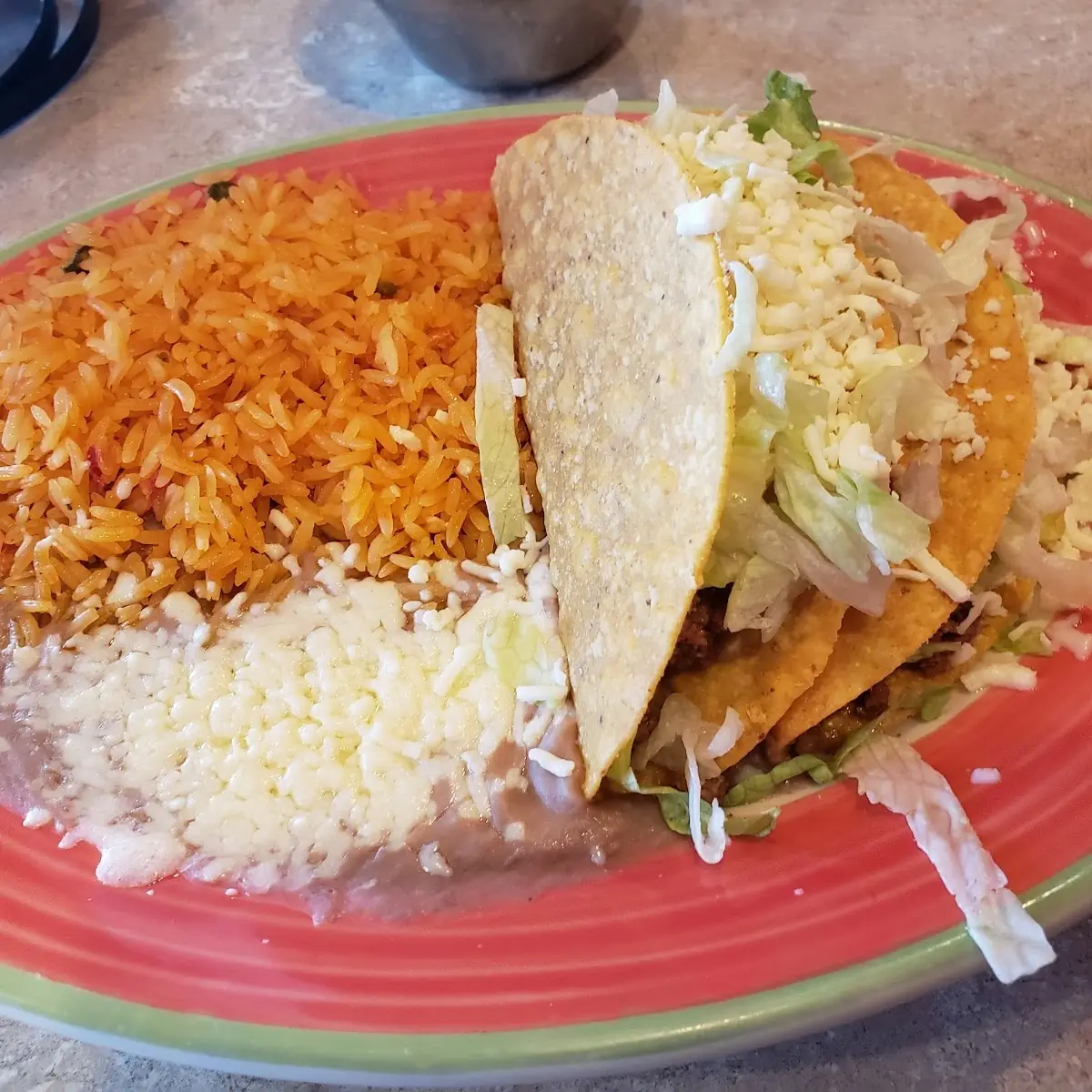 2 Tacos Spanish Rice and Refried Beans