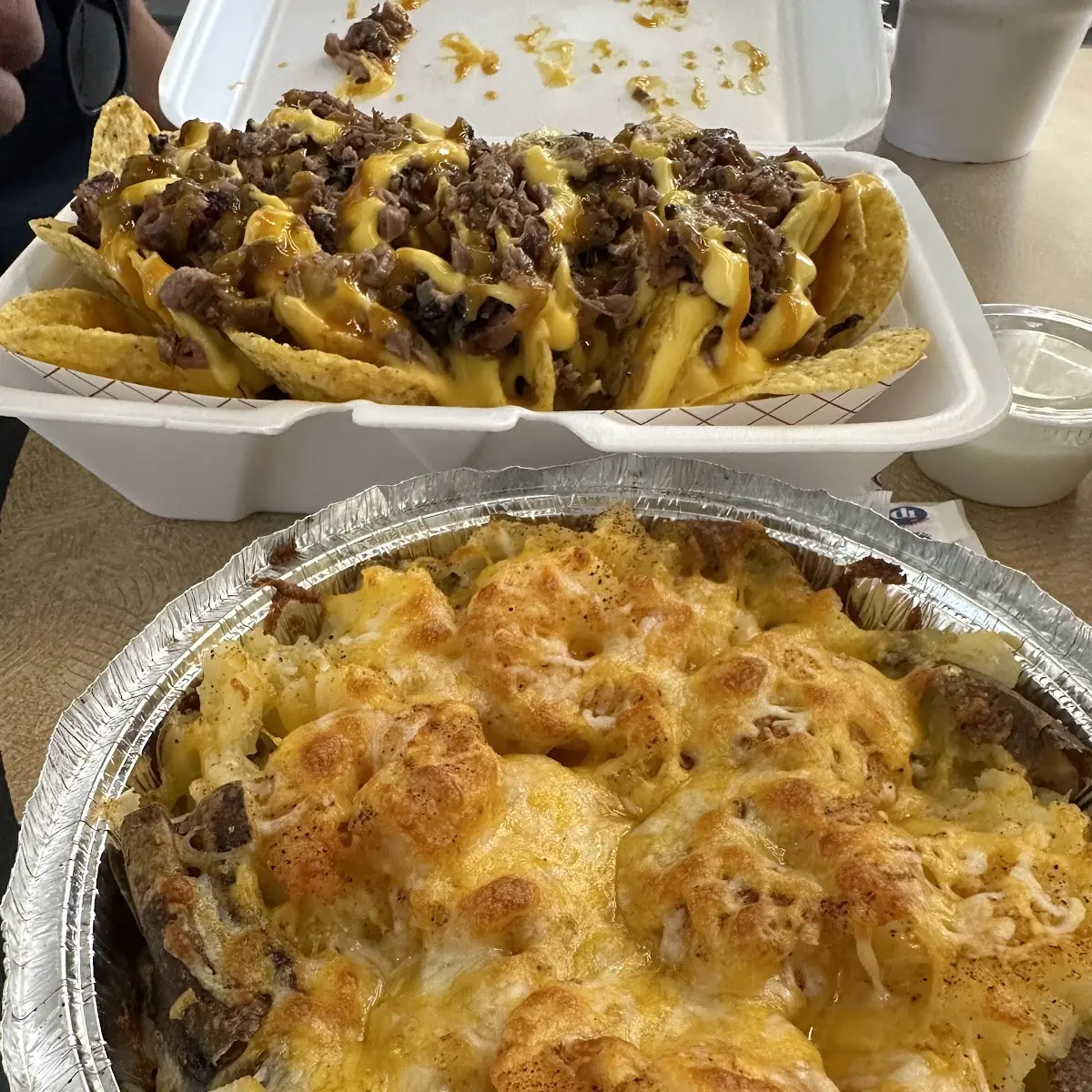 Pulled Pork Nachos & Cajun Shrimp Baked Potato