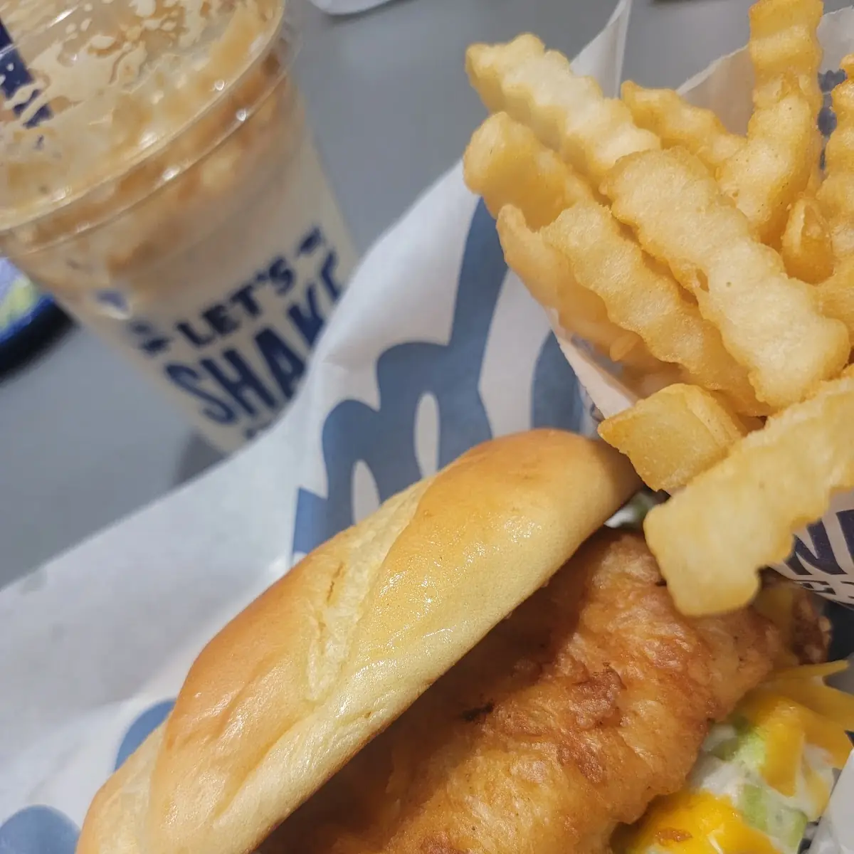Cod Fish Sandwich with Fries and a Reese Cup Peanut Butter Concrete