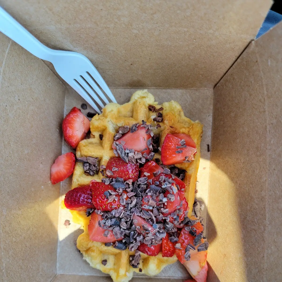 Belgian Waffle with Strawberries and Chocolate Nibs