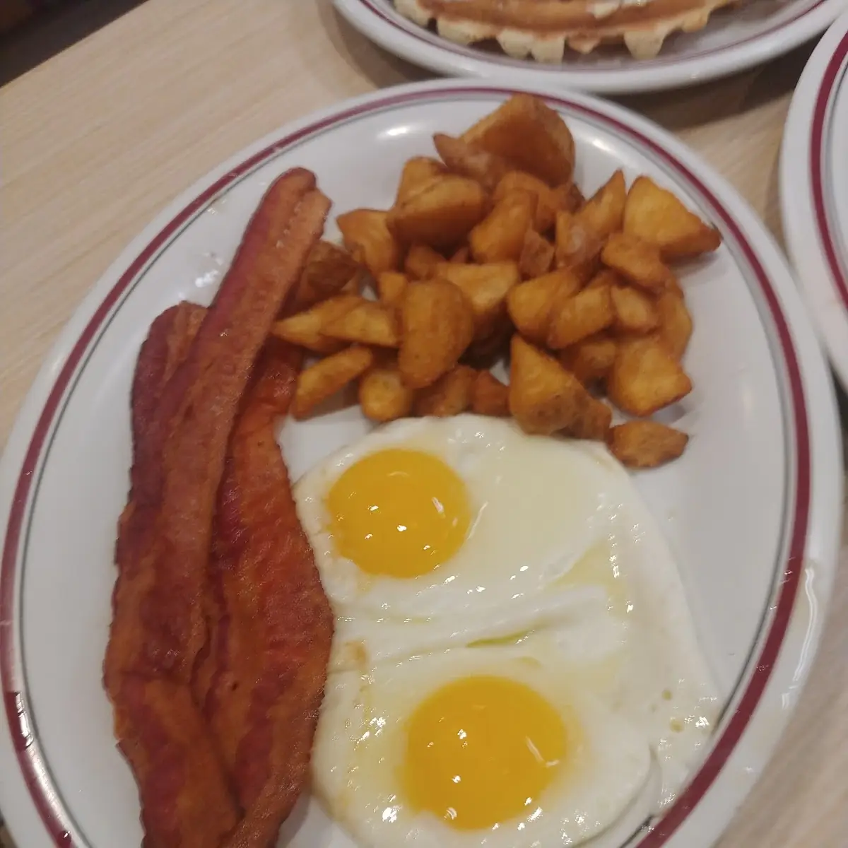 2 Eggs Bacon Potatoes and Toast