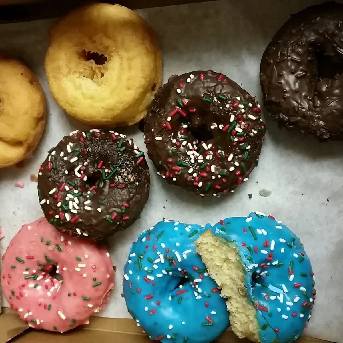 A Dozen Donuts One Minute After Opening the Box