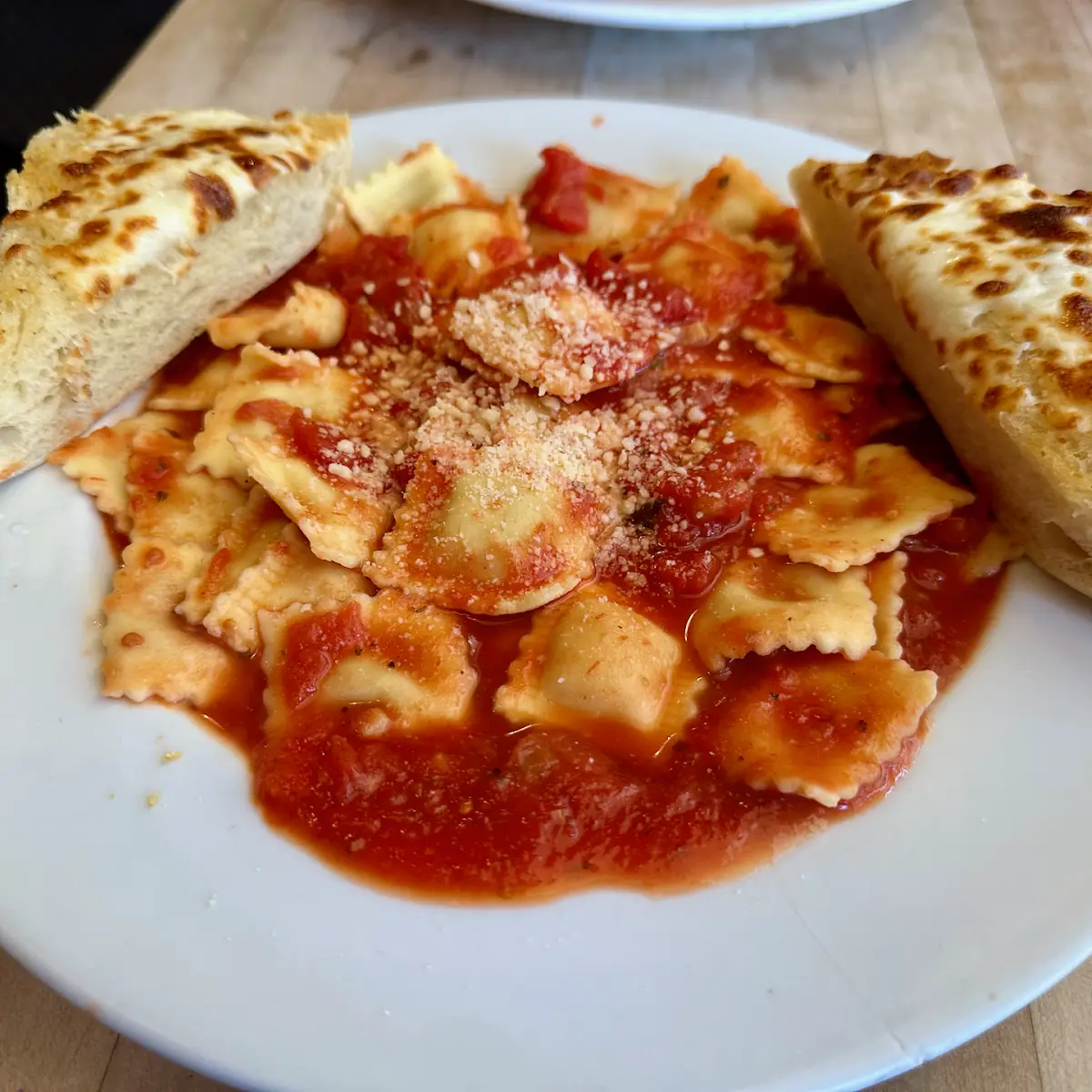 Vodka Sauce Ravioli Comes with Garlic Bread