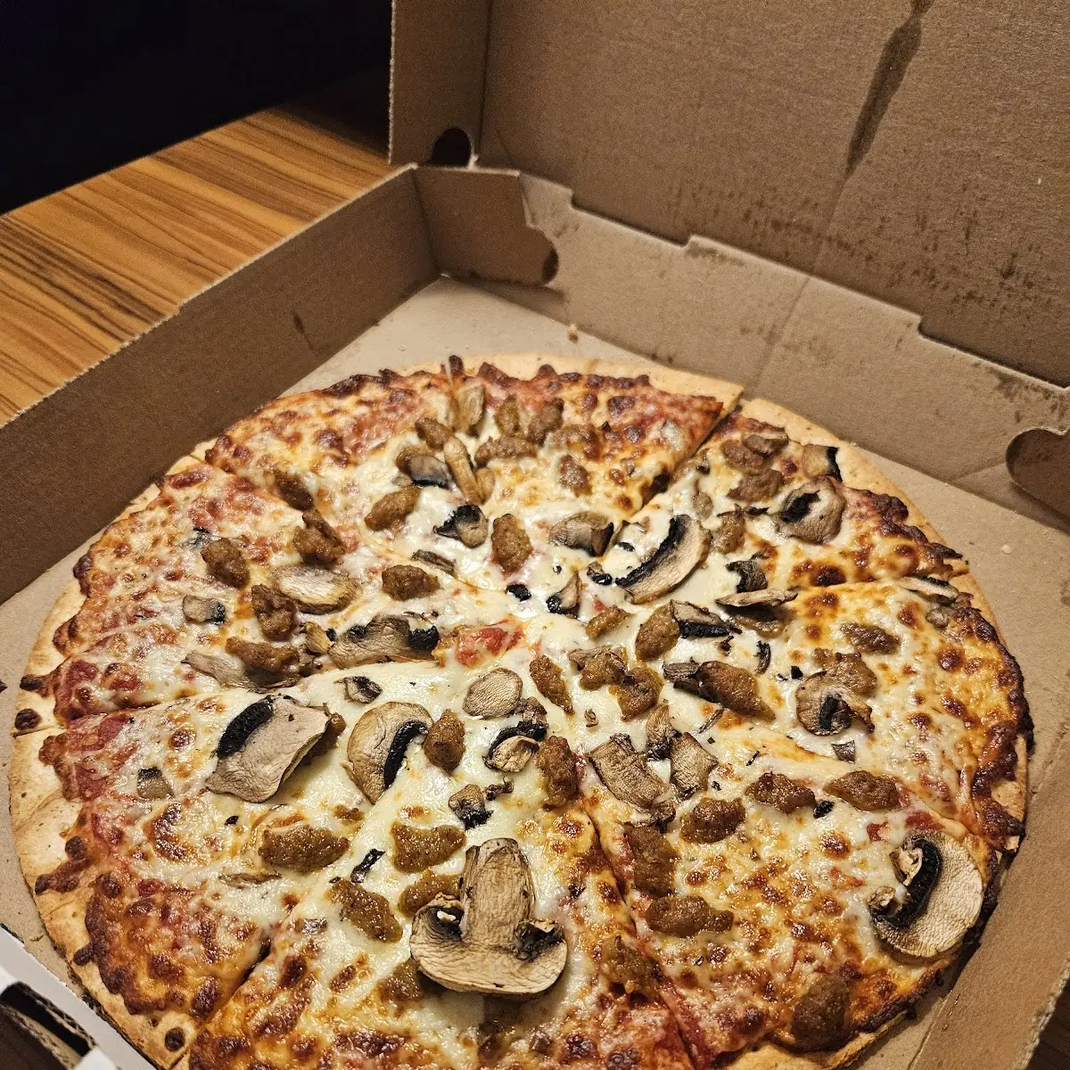 Thin Crust Sausage and Mushrooms