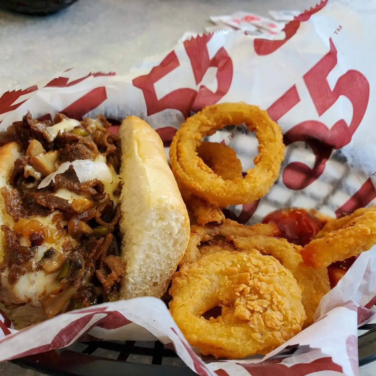 Philly Cheesesteak with Onion Rings