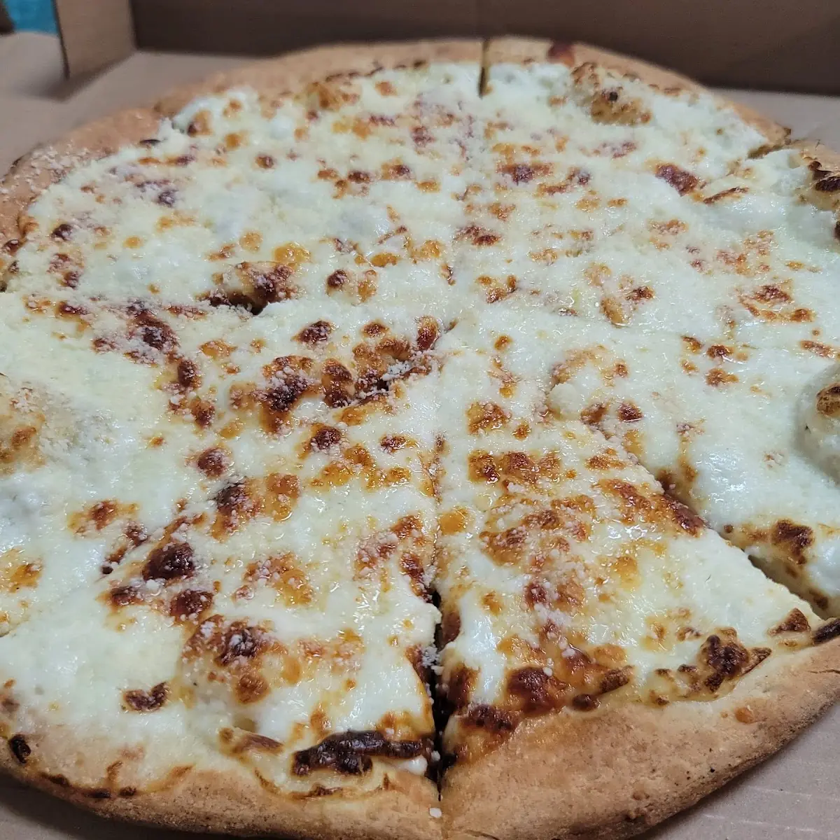 Four Cheese Deluxe Pizza