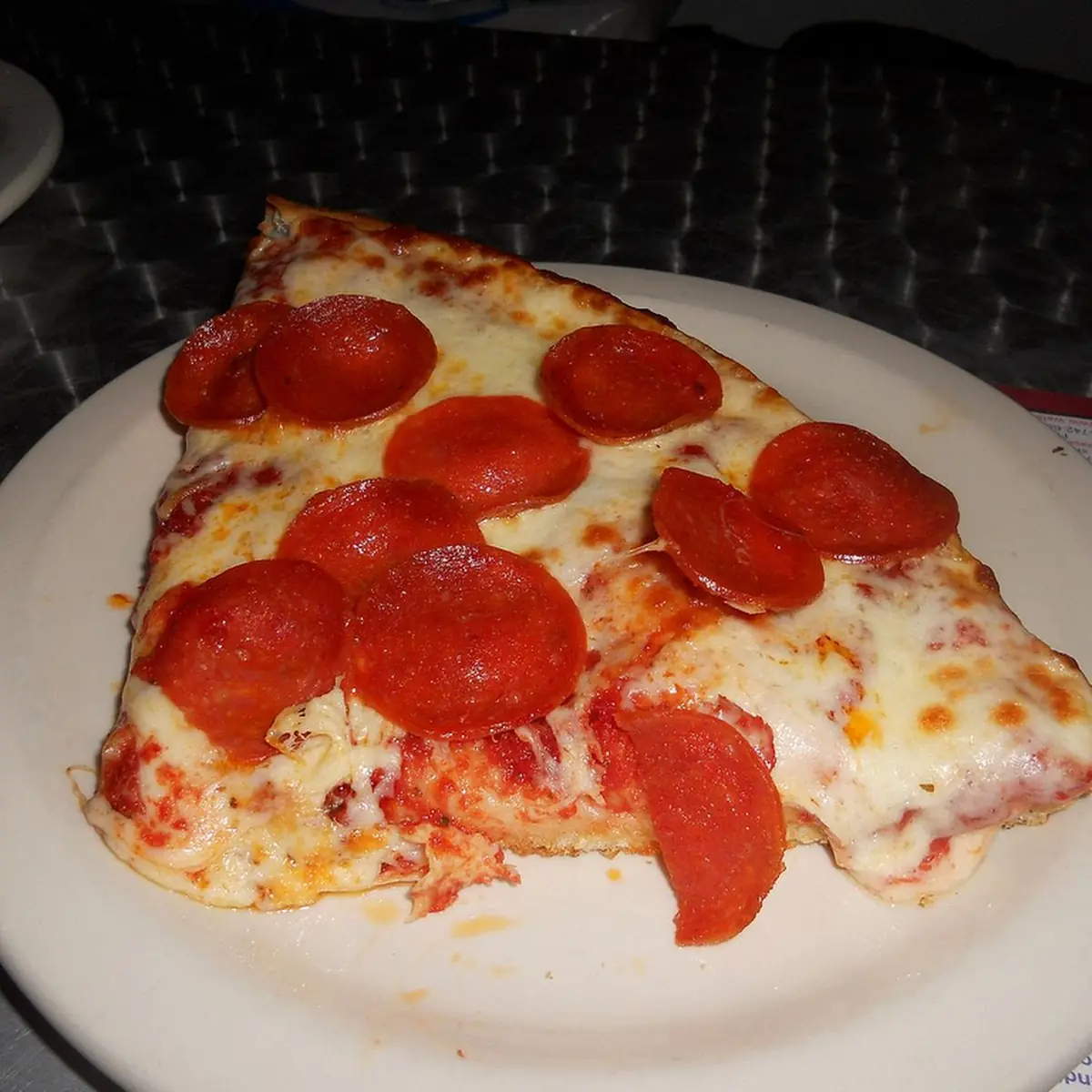 Slice of Pepperoni Pizza